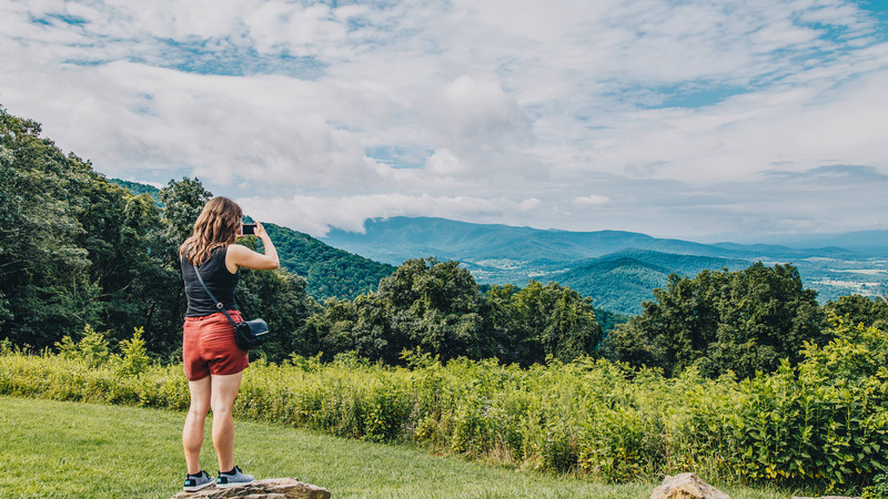 Woman takes photo in USA national park