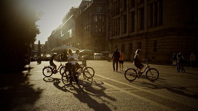 Friends cycling on a sunny afternoon