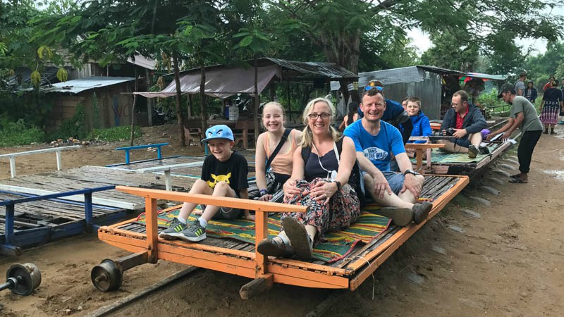 Helen's family riding the Bamboo Train