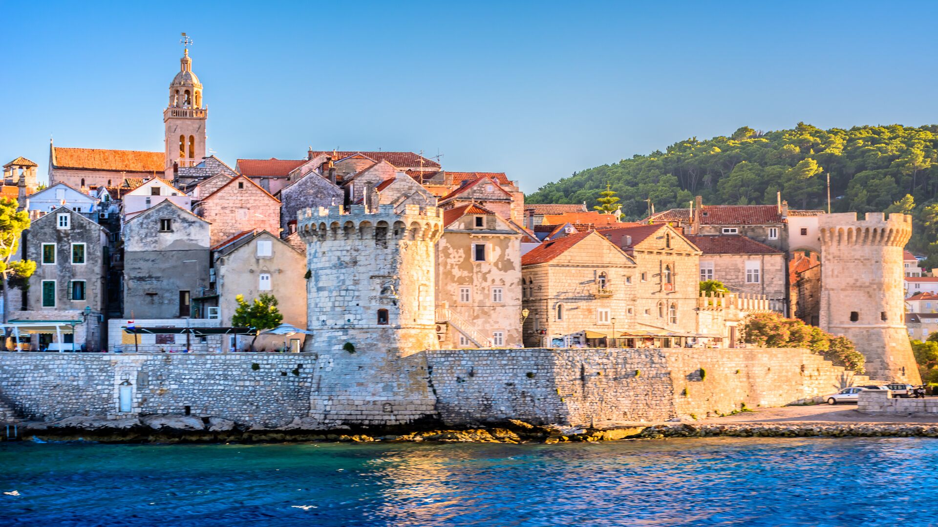 Korcula's Old Town on the coast with a sunny sky