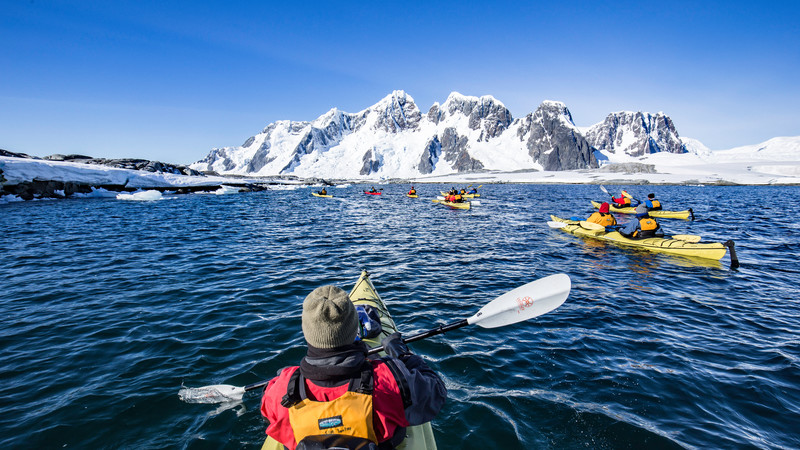 A group of kayakers in Antarctica
