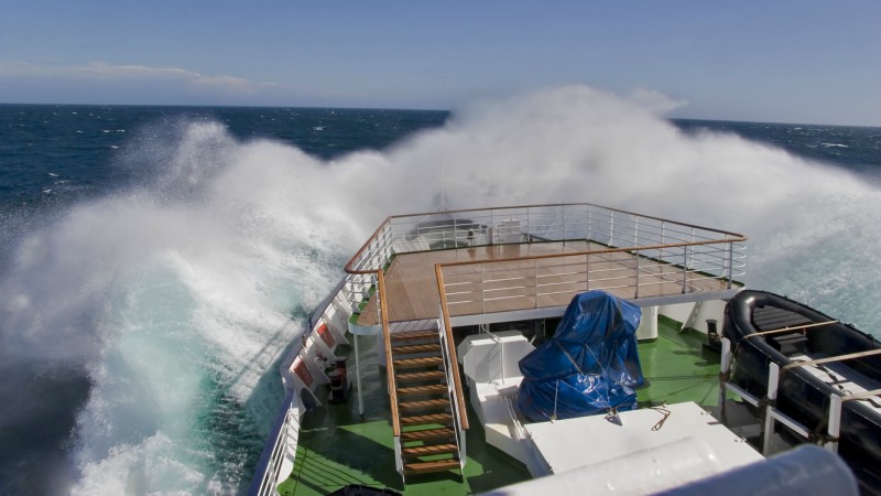 A ship crossing a rough Drake Passage, Antarctica