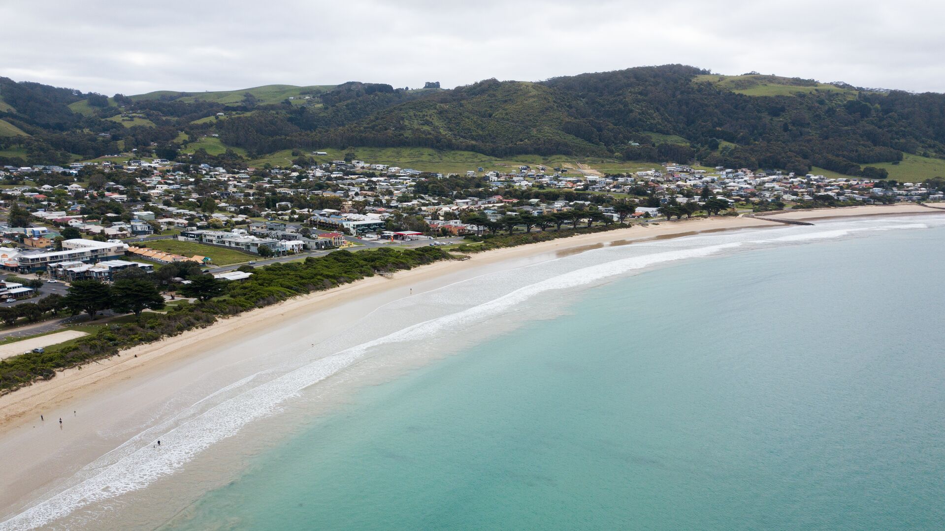 An aerial view of the water and township of Apollo Bay.