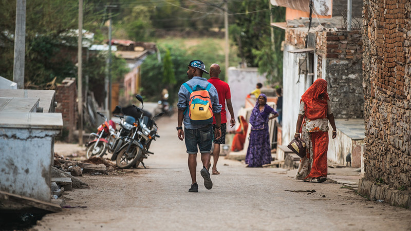 traveller walking through India