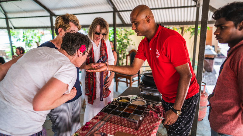 leader shows group some food