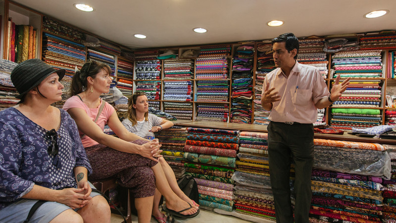 Local Indian man in fabric shop