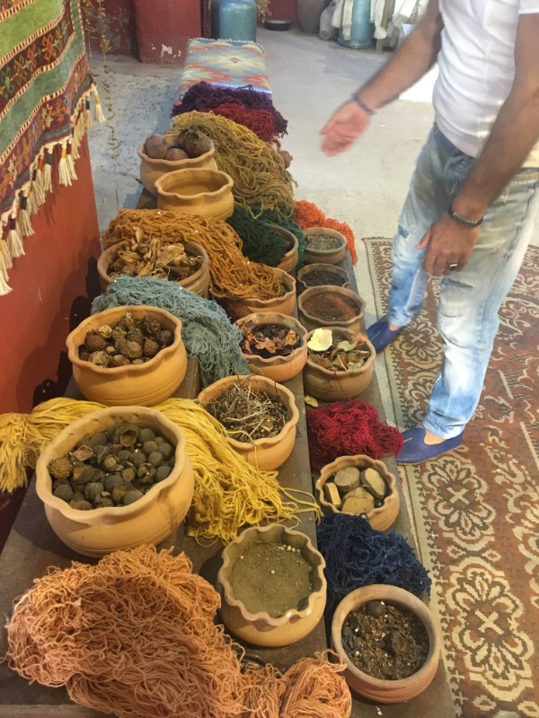 The yarn and natural dyes used for weaving.