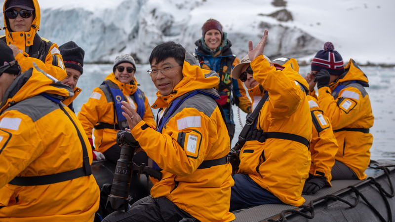 Travellers in the Arctic on a Zodiac