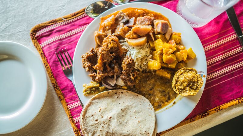 Photo from above featuring a plate of Indian food.