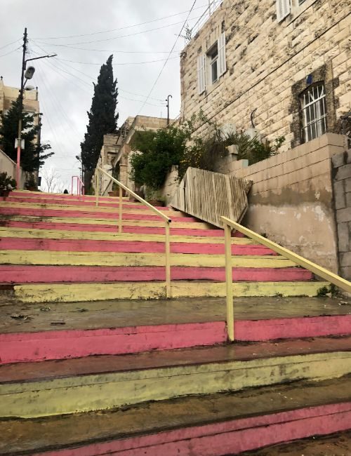 Pink and yellow stairs in Amman