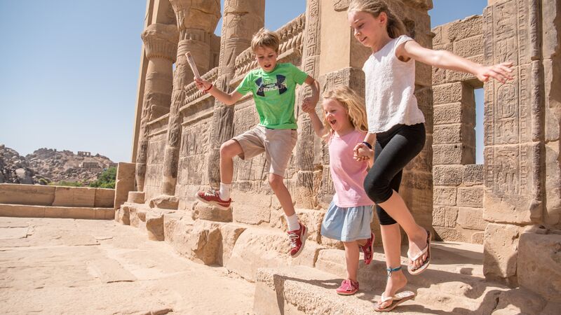 Three young children having fun in Egypt