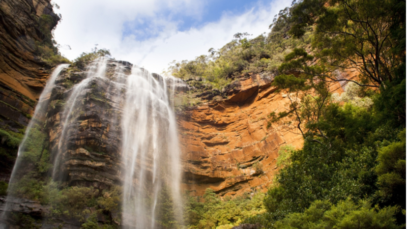 The three-tiered Wentworth Falls cascading down the rockface in the Blue Mountains, New South Wales.
