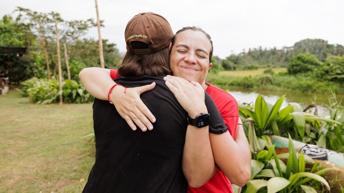 Intrepid leader Valeria hugs a fellow traveller