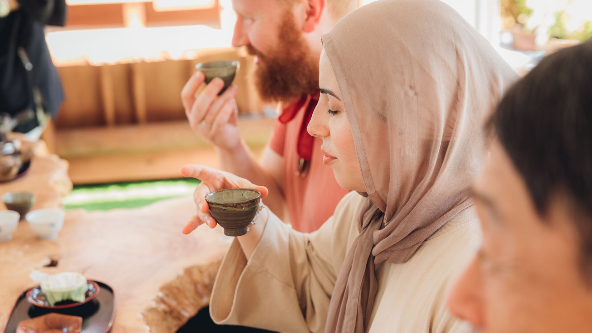 Intrepid travellers enjoy a moment of calm at a Japanese matcha ceremony