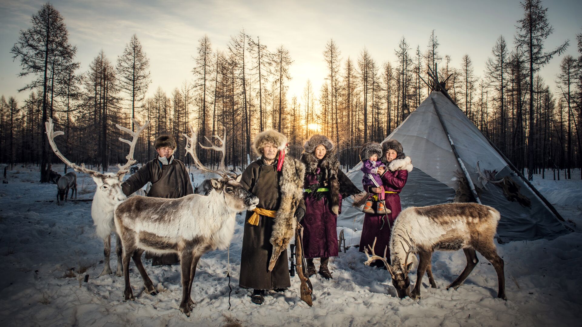 A family group of Tsaatan people in Mongolia.