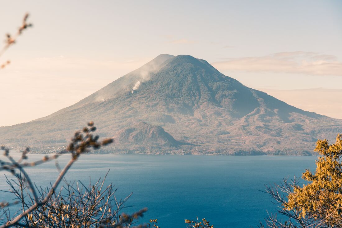 Atitlan Volcano lies beyond the expanse of Lake Atitlan in Guatemala