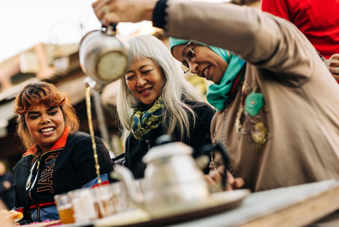 Travellers drinking tea in Marrakesh, Morocco
