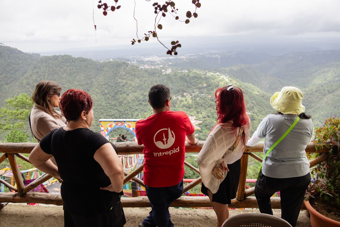 Intrepid leader and group looking out over Guatemala's highlands near Chichicastenango