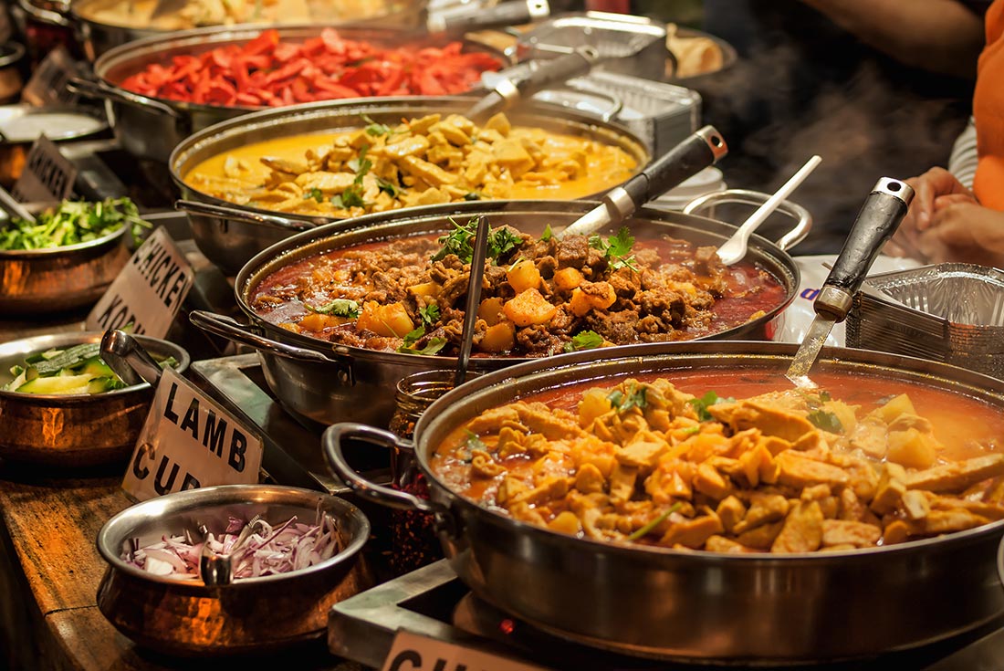 HHPG - Pots of traditional Indian curries on display