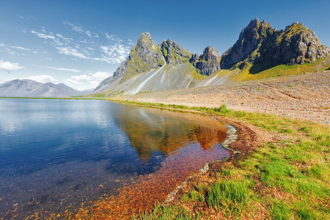 The crystal clear waters and mountains of Djupivogur, a little town located on an Icelandic penninsula