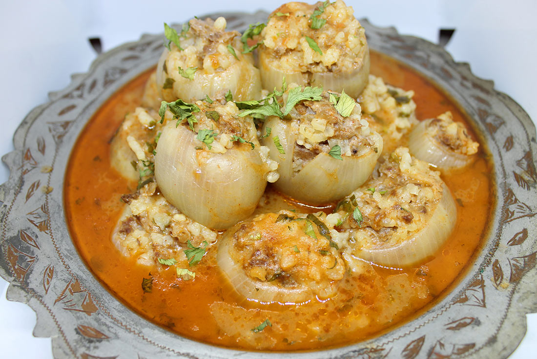 Learn how to make the traditional dish of Sogan Dolma at a Bosnian cooking class