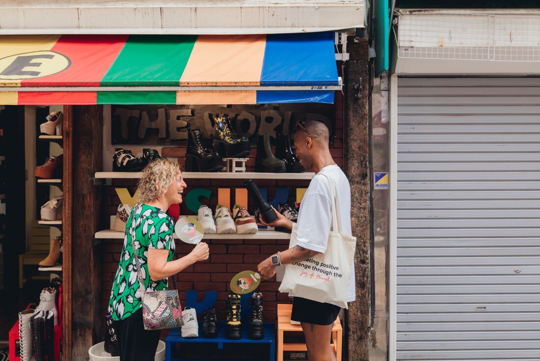 Intrepid travellers shopping while exploring the streets of Harajuku in Tokyo Japan