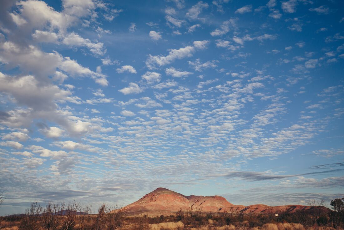 Mount Bruce gently rises against a placid sky in Karijini National Park